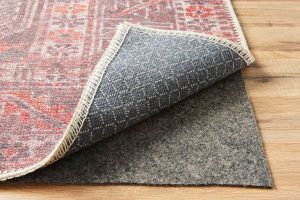 How to make a rug stay in place?